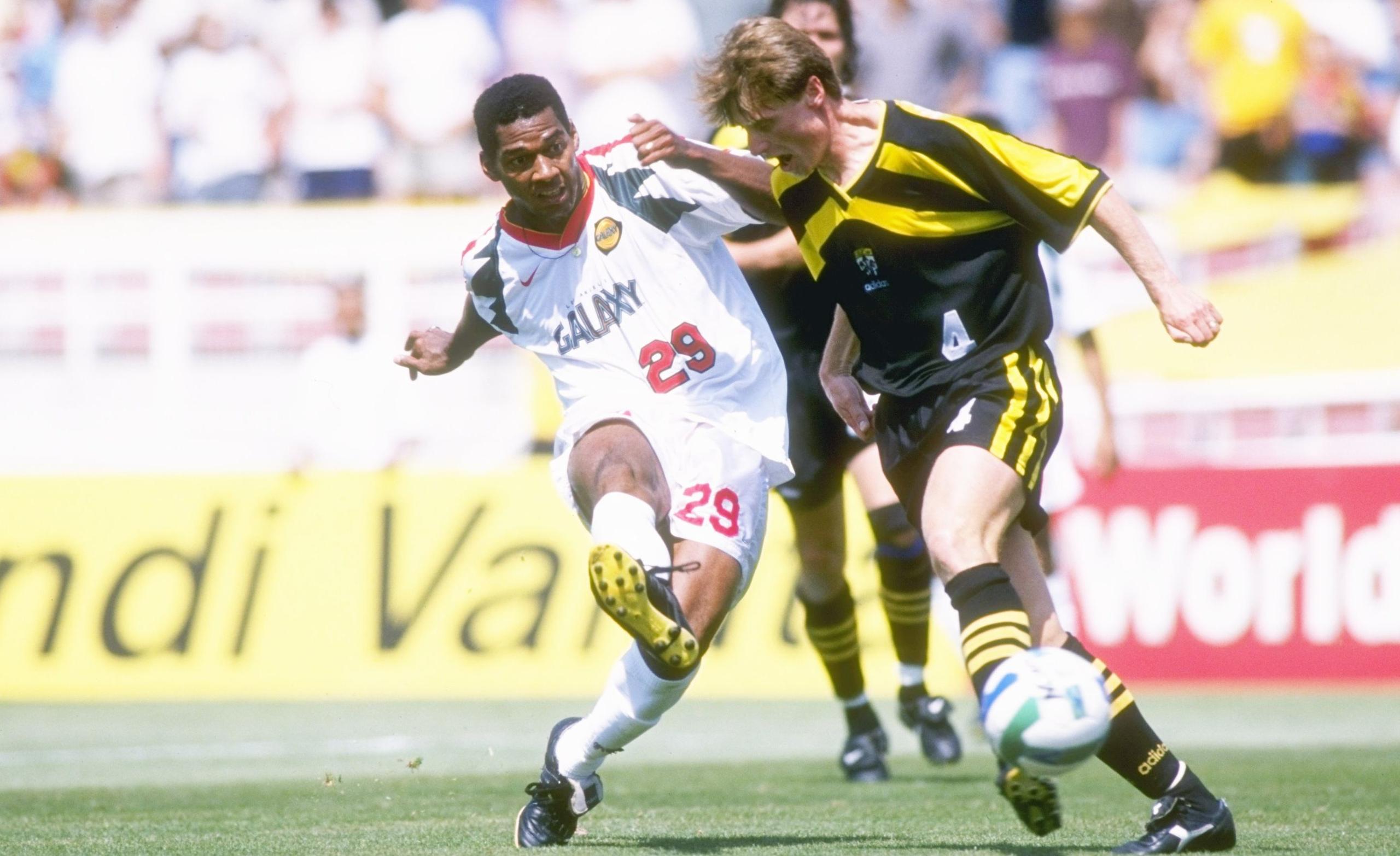 Eduardo Hurtado #29 of the Los Angeles Galaxy and Janusz Michallik #4 of the Columbus Crew fight for the ball during an MLS game played at the Rose Bowl in Pasadena, California. The Galaxy won the game, 3-2.