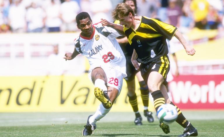 Eduardo Hurtado #29 of the Los Angeles Galaxy and Janusz Michallik #4 of the Columbus Crew fight for the ball during an MLS game played at the Rose Bowl in Pasadena, California. The Galaxy won the game, 3-2.