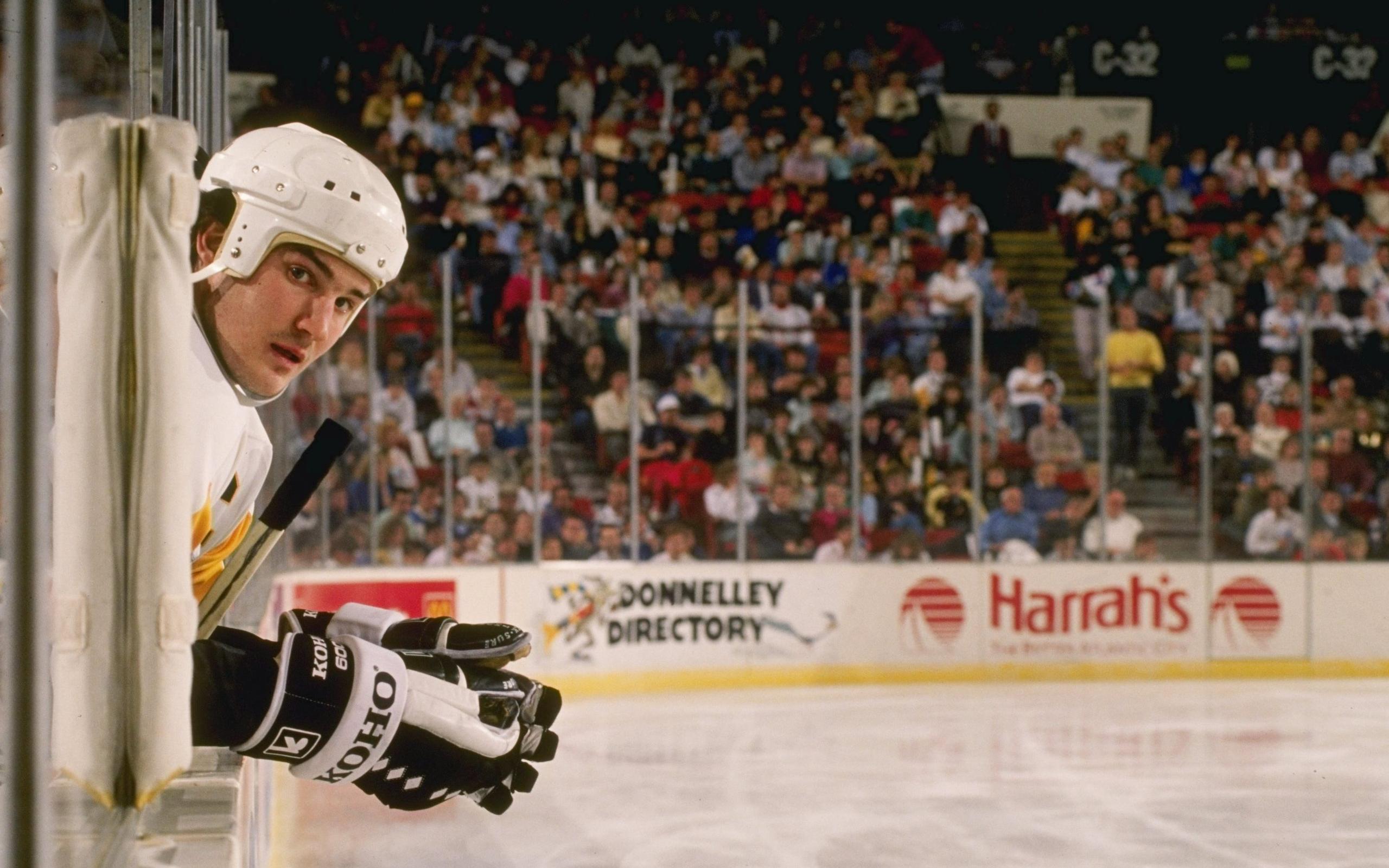 Apr 1985: Center Mario Lemieux of the Pittsburgh Penguins sits on the bench at the Pittsburgh Civic Arena in Pittsburgh, Pennsylvania. Mandatory Credit: Allsport /Allsport