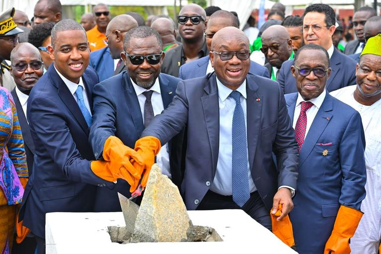 Nelson Fernandes (L) during the laying of the foundation stone for the modernization of the national technical center of Côte d’Ivoire