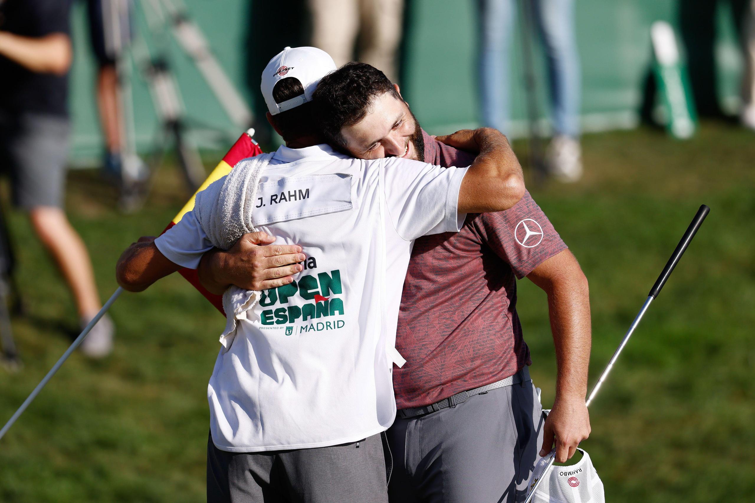 Jon Rahm hugs caddie after winning the 2022 Acciona Open de España