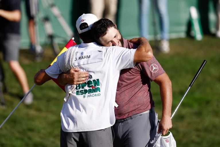 Jon Rahm hugs caddie after winning the 2022 Acciona Open de España